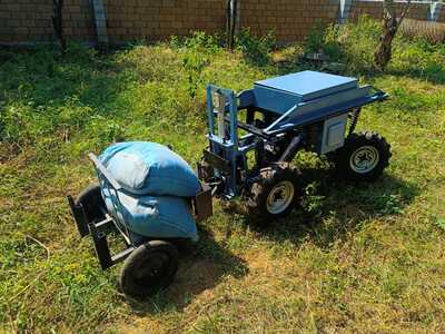 MEVA Electric Vehicle with 3 Attachments